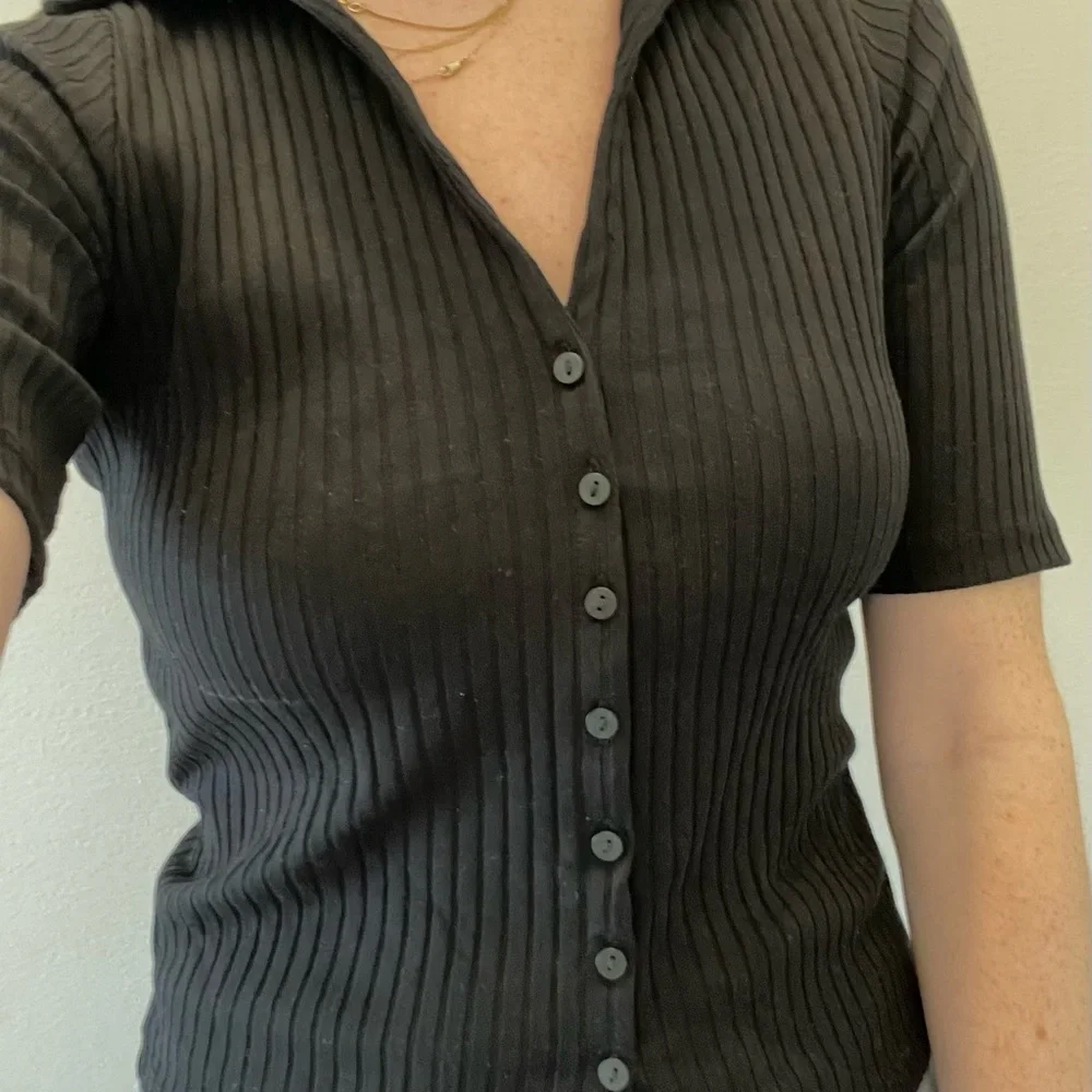 Black Ribbed Button-Front Polo Top - Picture 6 of 7